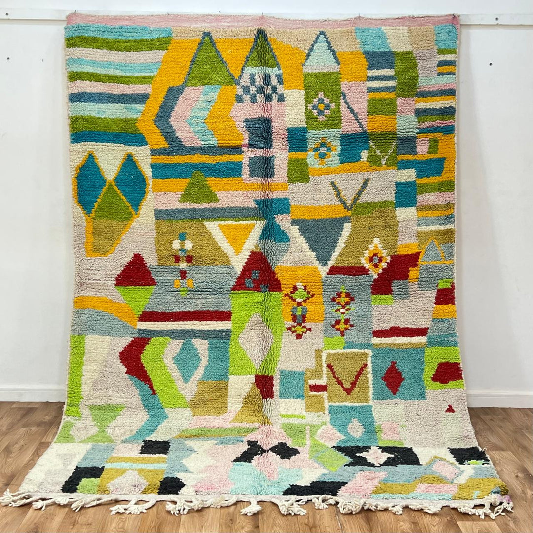 Vintage Moroccan wool rug 881 – handmade Berber carpet with colorful geometric pattern in red, green, turquoise, and mustard. 275 × 192 cm (9.02 × 6.29 ft).