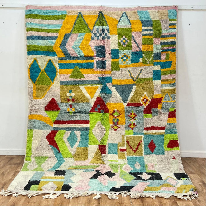 Vintage Moroccan wool rug 881 – handmade Berber carpet with colorful geometric pattern in red, green, turquoise, and mustard. 275 × 192 cm (9.02 × 6.29 ft).