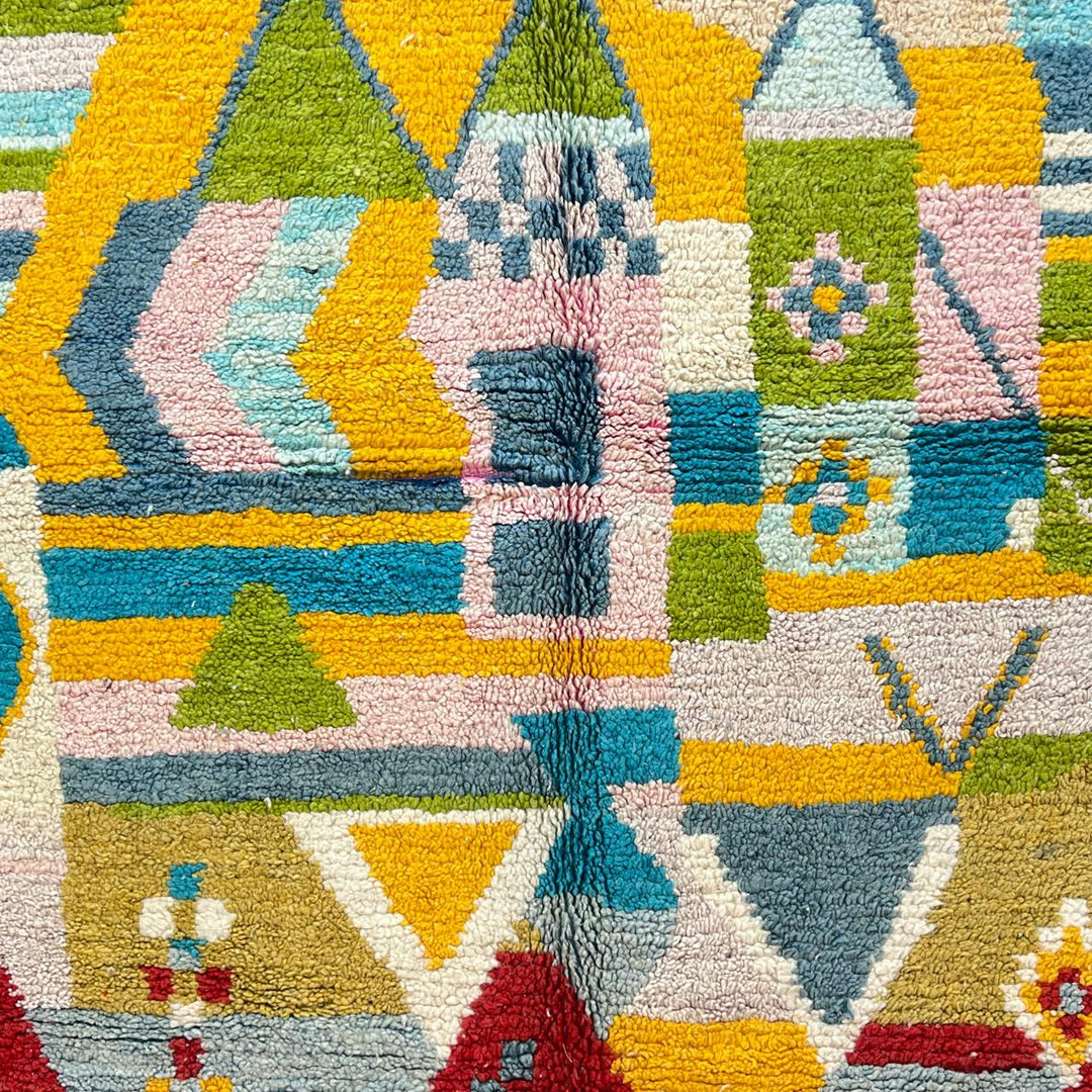 Vintage Moroccan wool rug 881 – handmade Berber carpet with colorful geometric pattern in red, green, turquoise, and mustard. 275 × 192 cm (9.02 × 6.29 ft).