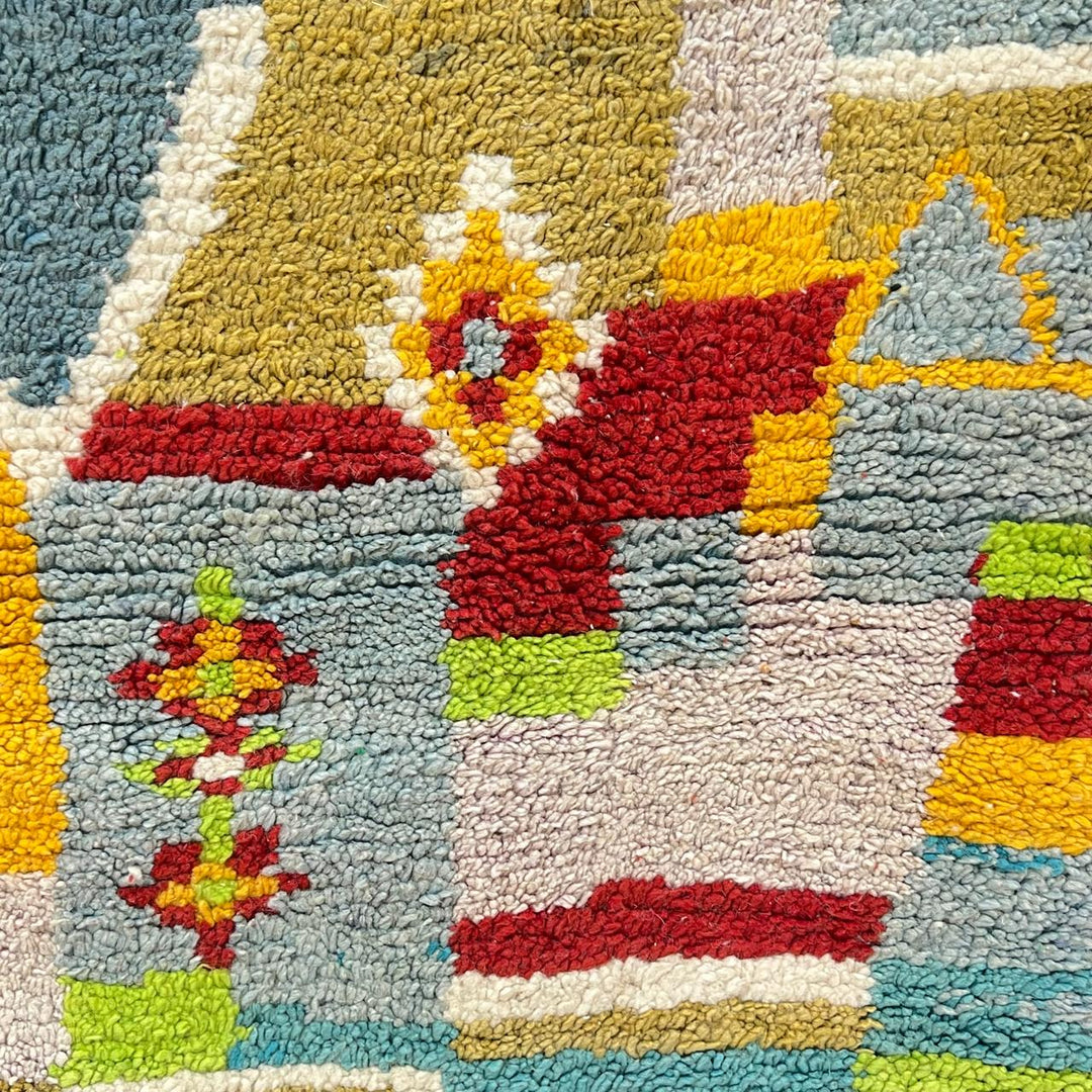 Vintage Moroccan wool rug 881 – handmade Berber carpet with colorful geometric pattern in red, green, turquoise, and mustard. 275 × 192 cm (9.02 × 6.29 ft).