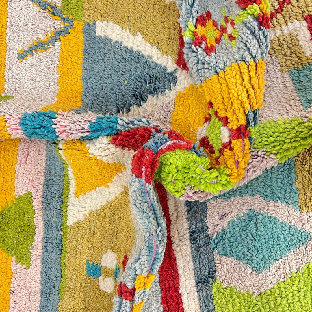 Vintage Moroccan wool rug 881 – handmade Berber carpet with colorful geometric pattern in red, green, turquoise, and mustard. 275 × 192 cm (9.02 × 6.29 ft).