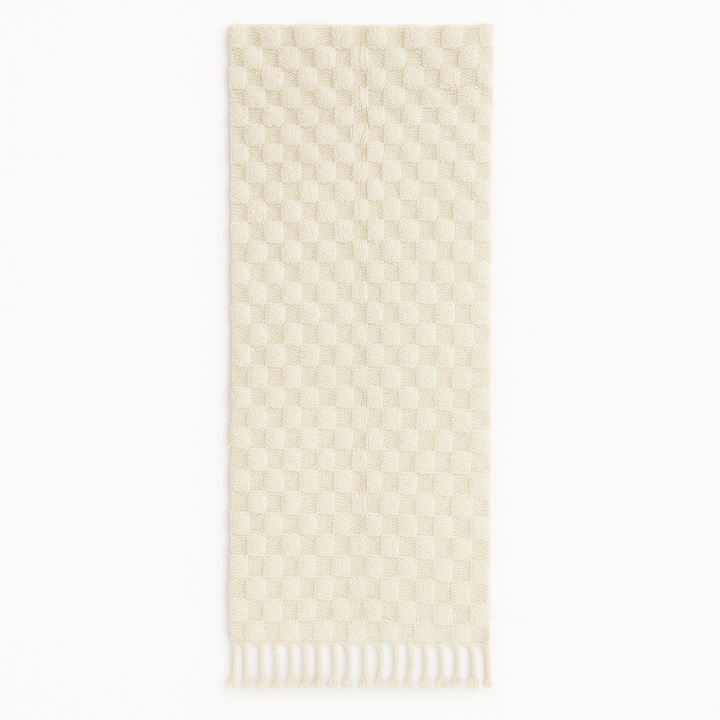 Handmade white Moroccan wool runner rug with subtle checkerboard pattern and fringe edges