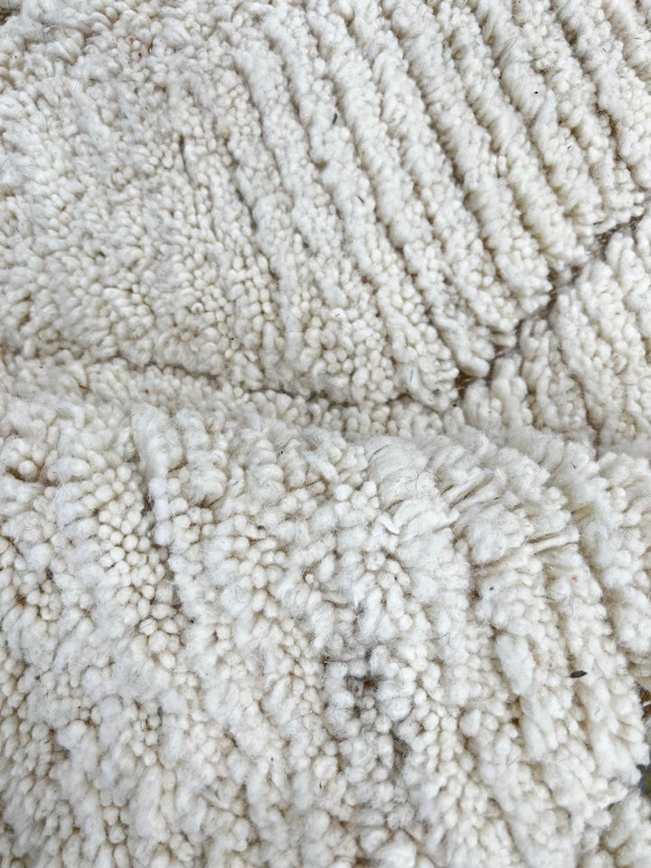 Handmade white Moroccan wool runner rug with subtle diamond Berber pattern