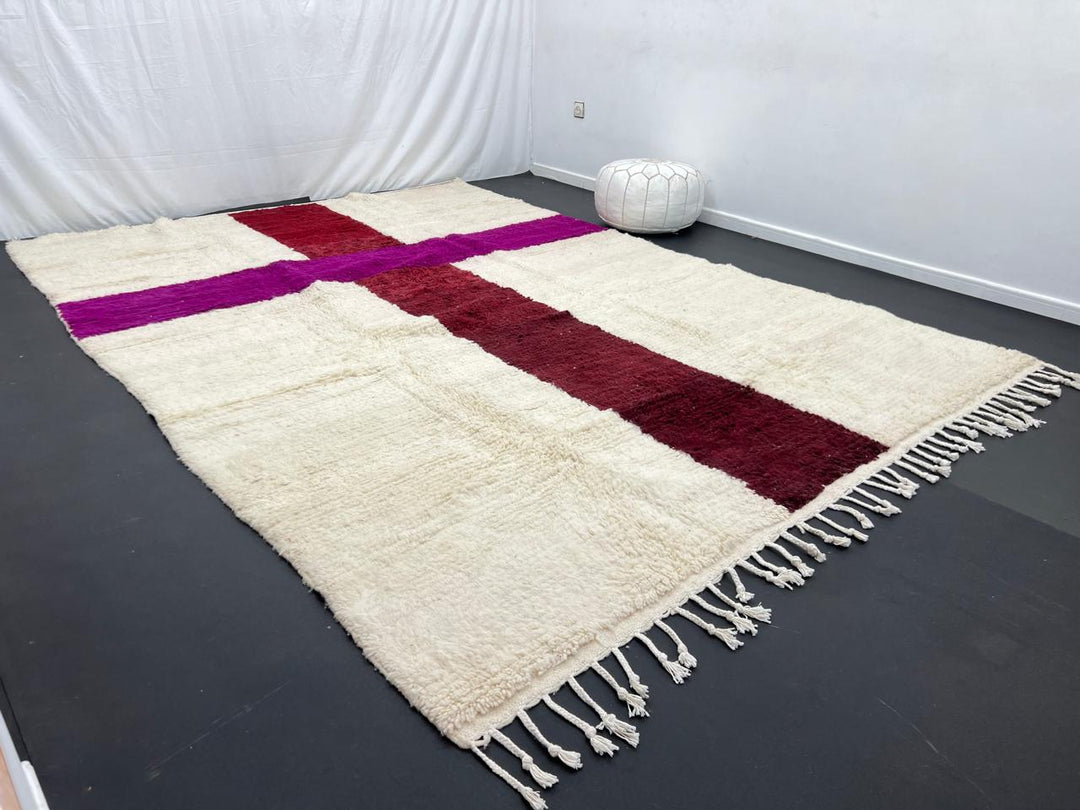 White Moroccan wool rug with burgundy and plum cross pattern, handmade in Morocco