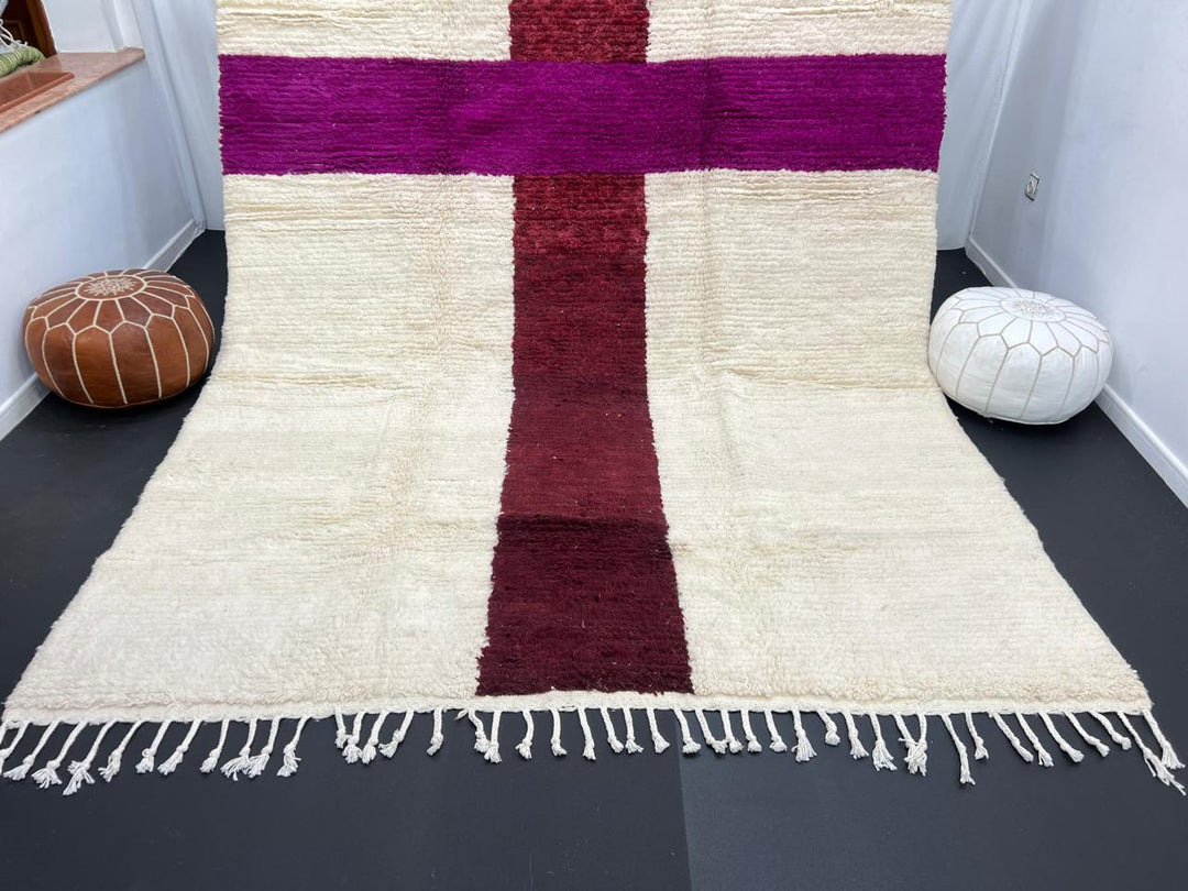 White Moroccan wool rug with burgundy and plum cross pattern, handmade in Morocco