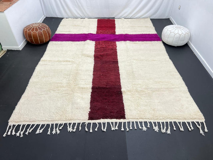 White Moroccan wool rug with burgundy and plum cross pattern, handmade in Morocco