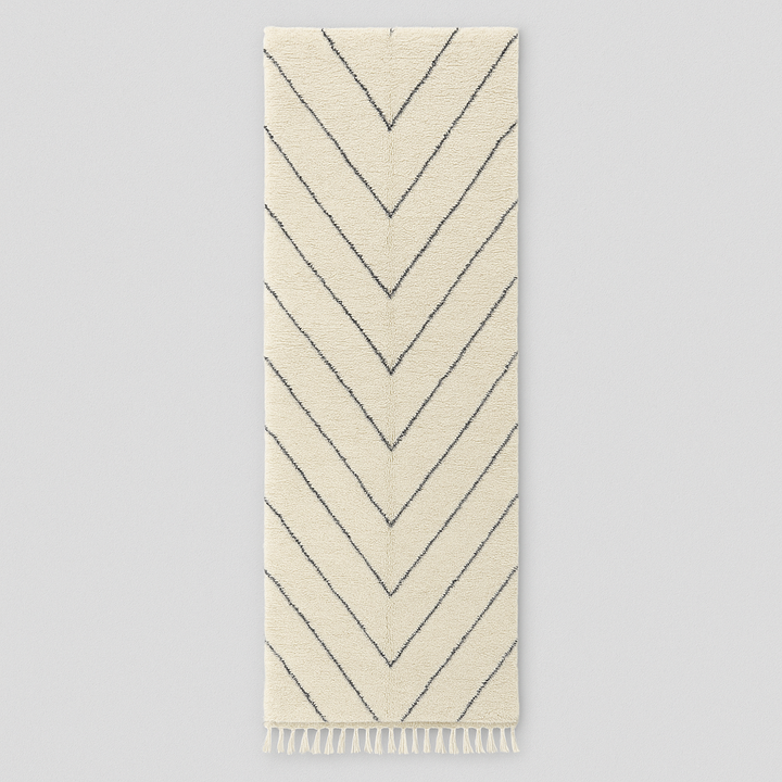 Handmade white Moroccan wool runner rug with charcoal chevron pattern