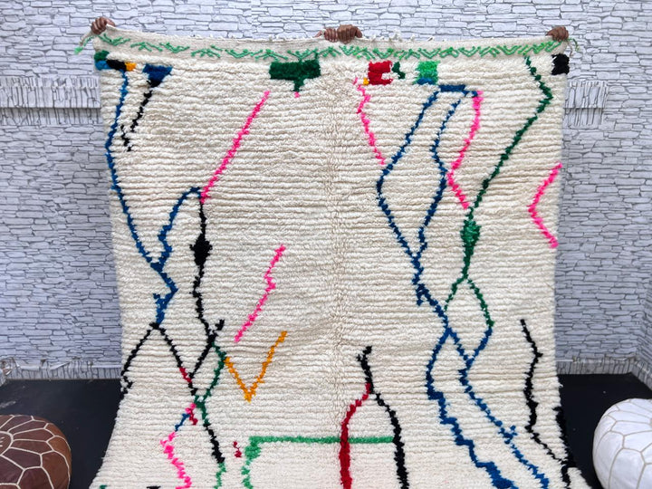 white handmade moroccan berber rug with abstract multicolor line design in wool