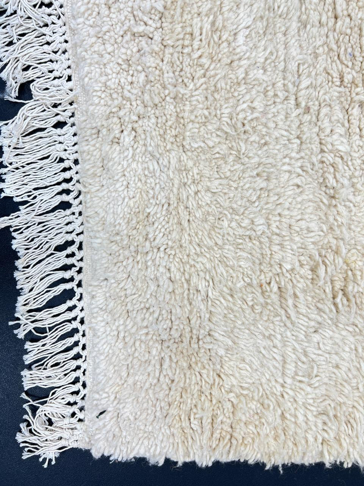 Handmade white Moroccan wool runner rug with minimalist design