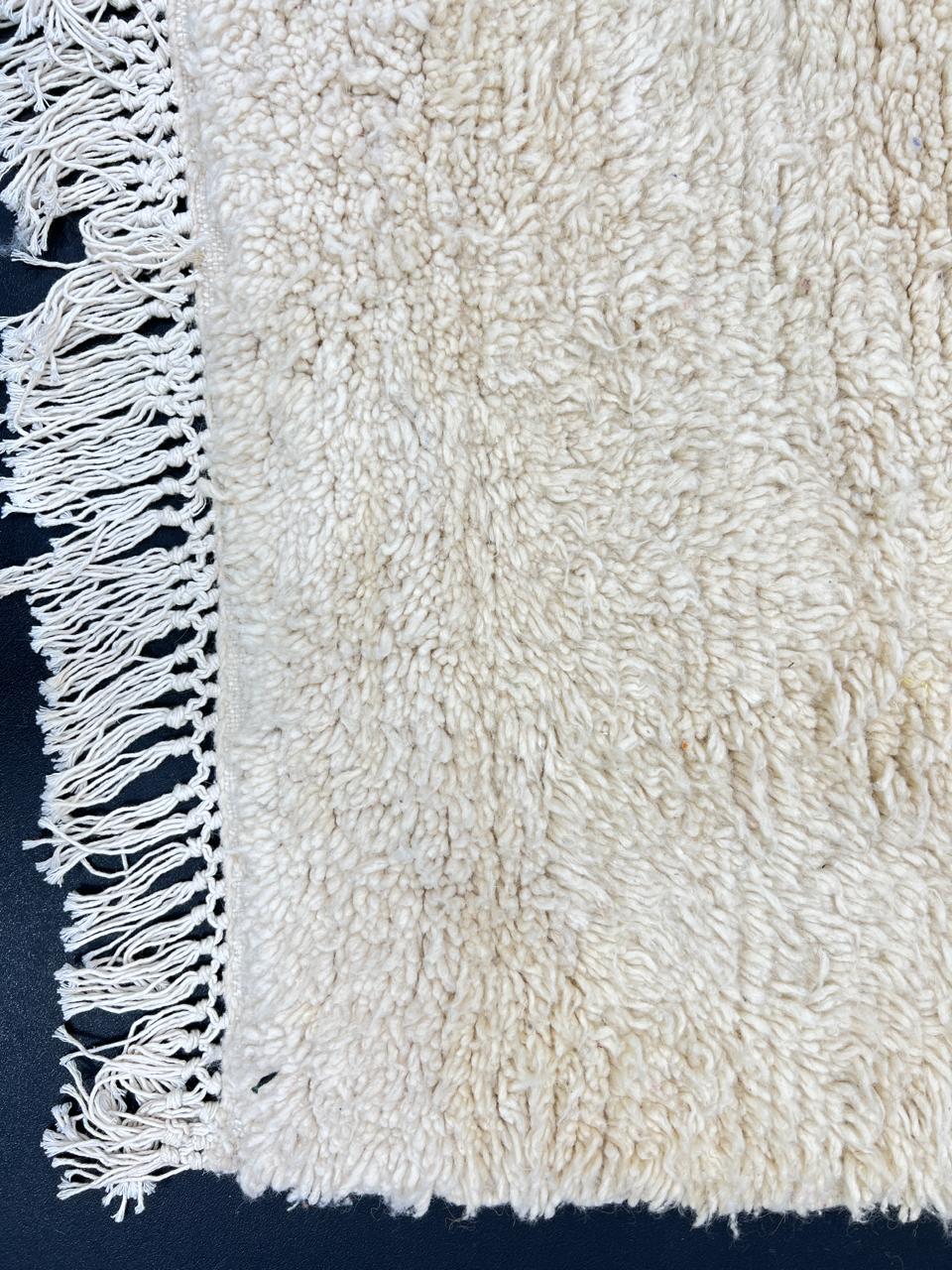 Handmade white Moroccan wool runner rug with minimalist design