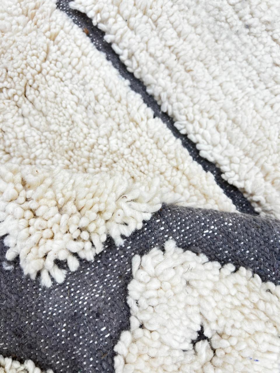 Handmade white Moroccan runner rug with grey tribal border and diamond motifs, Berber wool hallway carpet, minimalist modern Moroccan runner design.