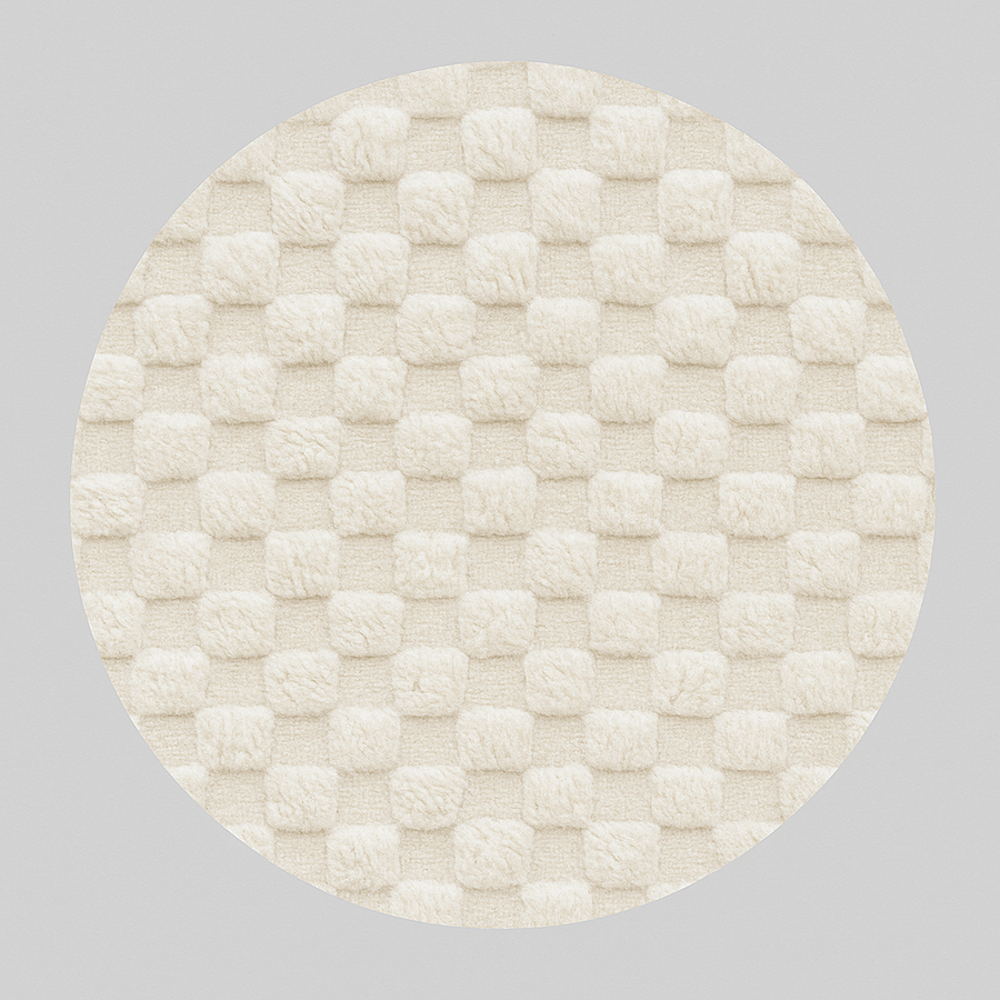 Round white Moroccan wool rug with raised checkered 3D texture.