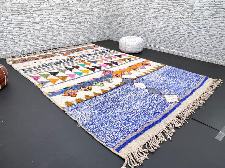 ivory and blue handmade moroccan berber rug with geometric tribal patterns in wool