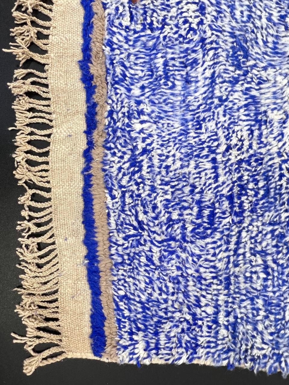 ivory and blue handmade moroccan berber rug with geometric tribal patterns in wool