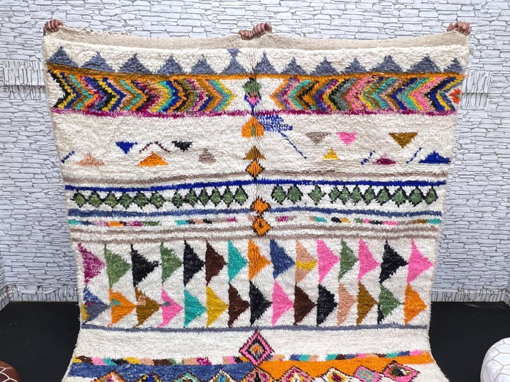 ivory and blue handmade moroccan berber rug with geometric tribal patterns in wool