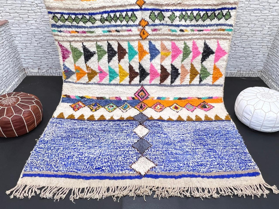 ivory and blue handmade moroccan berber rug with geometric tribal patterns in wool