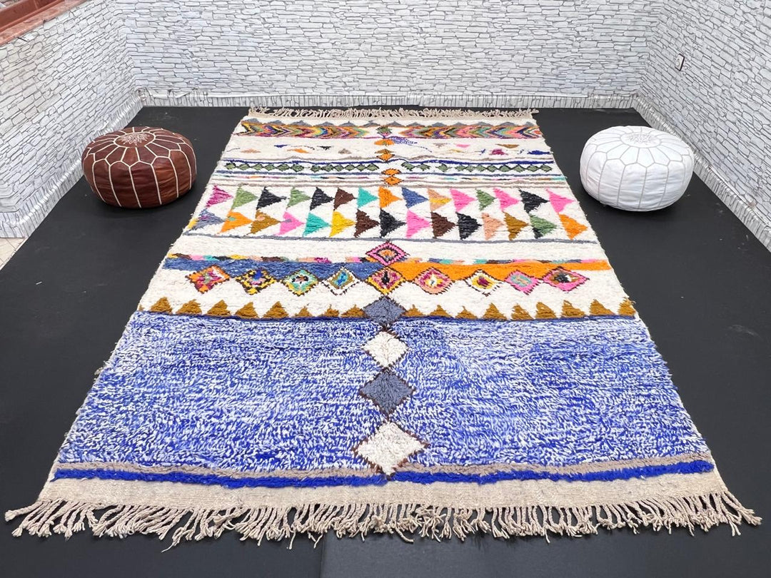 ivory and blue handmade moroccan berber rug with geometric tribal patterns in wool