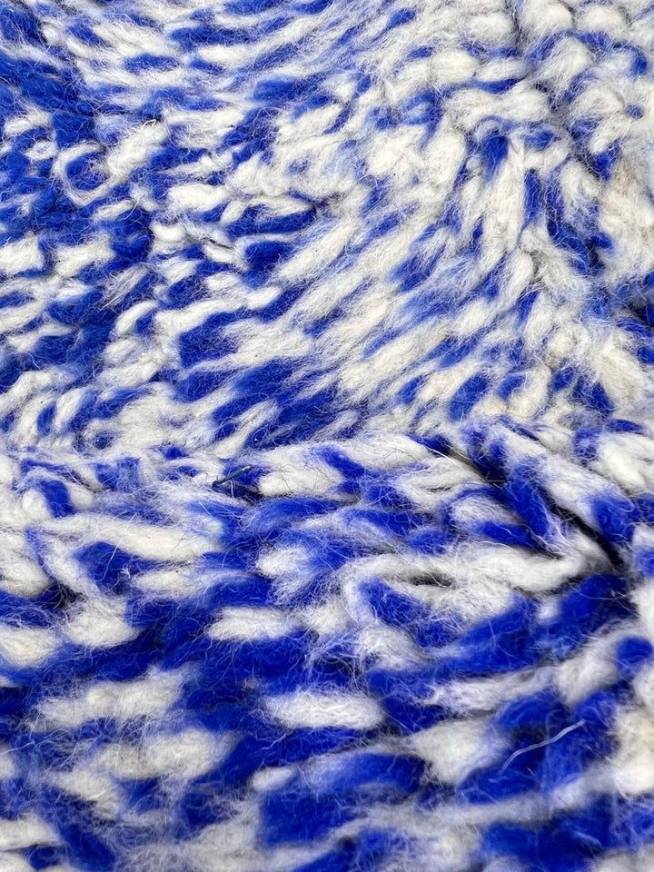 ivory and blue handmade moroccan berber rug with geometric tribal patterns in wool