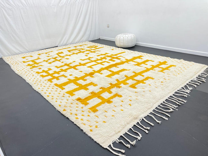 white moroccan wool rug with yellow berber geometric symbols handmade
