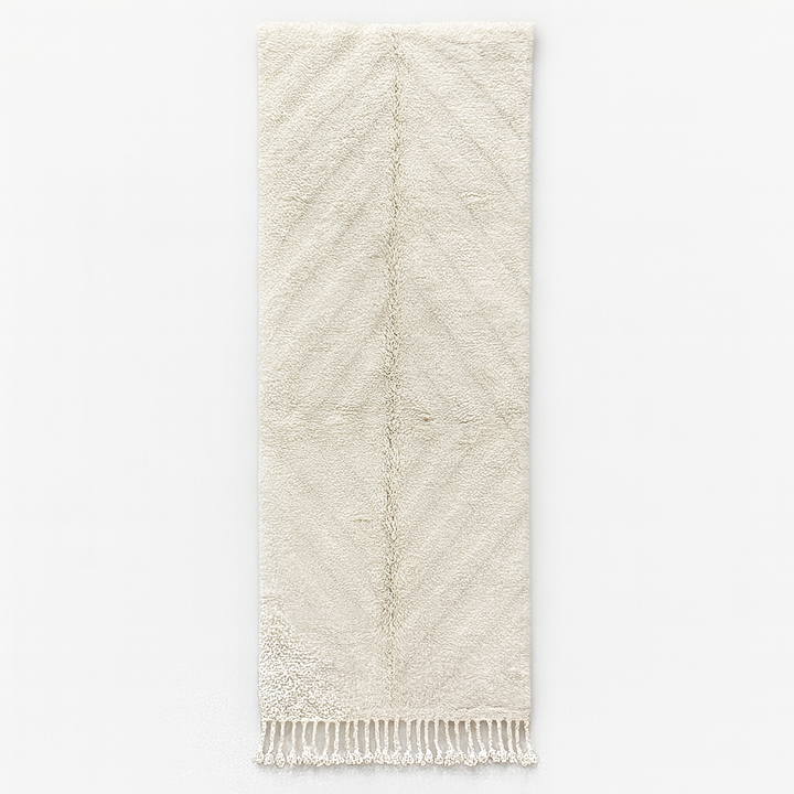 Handmade white Moroccan runner rug with subtle carved chevron texture in natural wool.