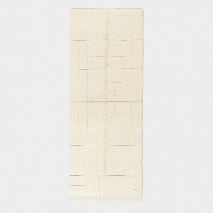 Handmade white minimalist Moroccan runner rug with subtle geometric carved design.