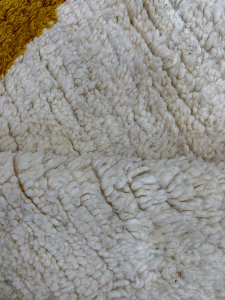 Handmade white Moroccan wool runner rug with multicolor diamond and line motifs