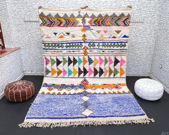ivory and blue handmade moroccan berber rug with geometric tribal patterns in wool