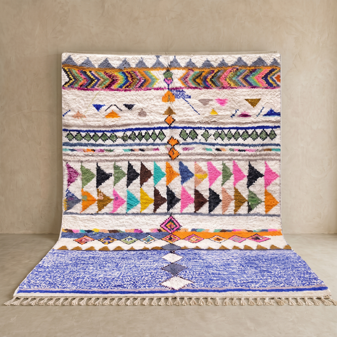 ivory and blue handmade moroccan berber rug with geometric tribal patterns in wool
