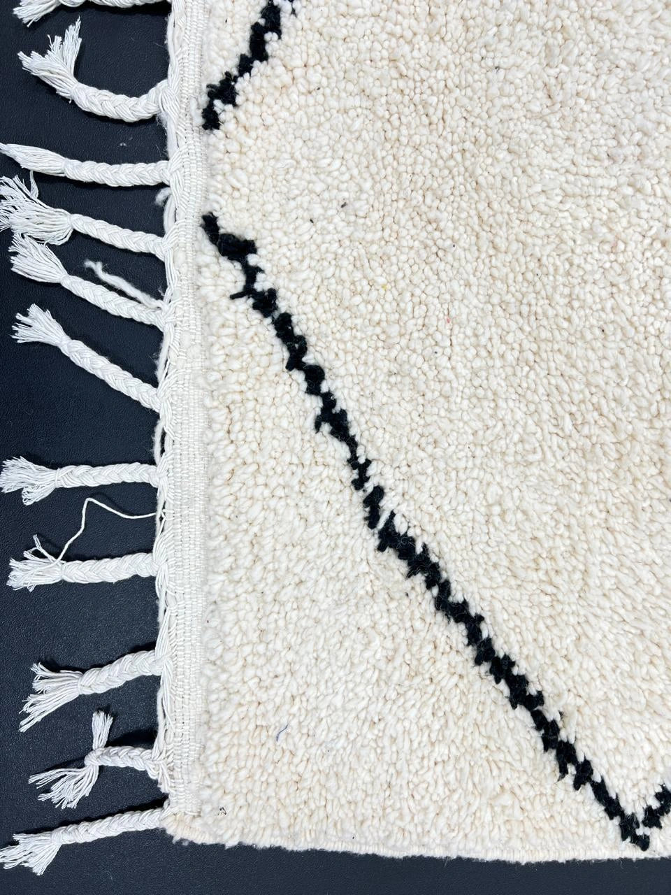 Handmade Moroccan wool runner rug in white with black diamond-line design, Beni Ourain style