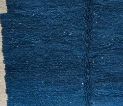 Handmade white and navy blue Moroccan wool runner rug with geometric border design