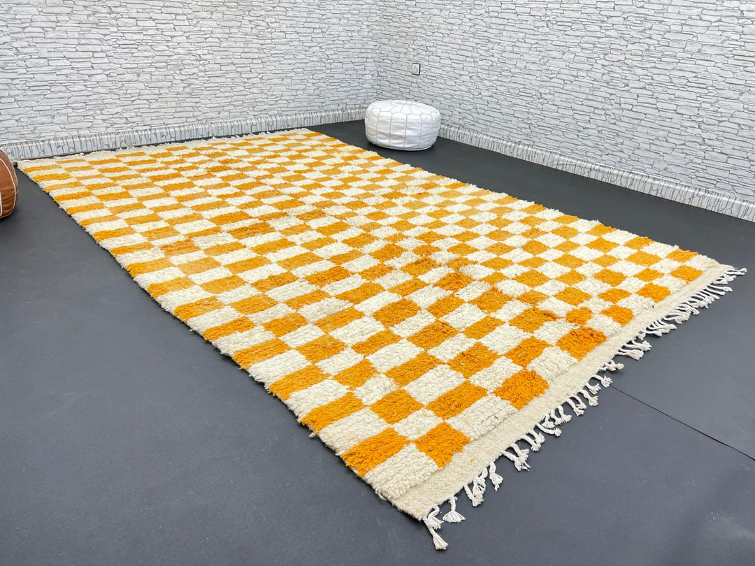 Handwoven Moroccan wool rug with yellow and cream checkered pattern