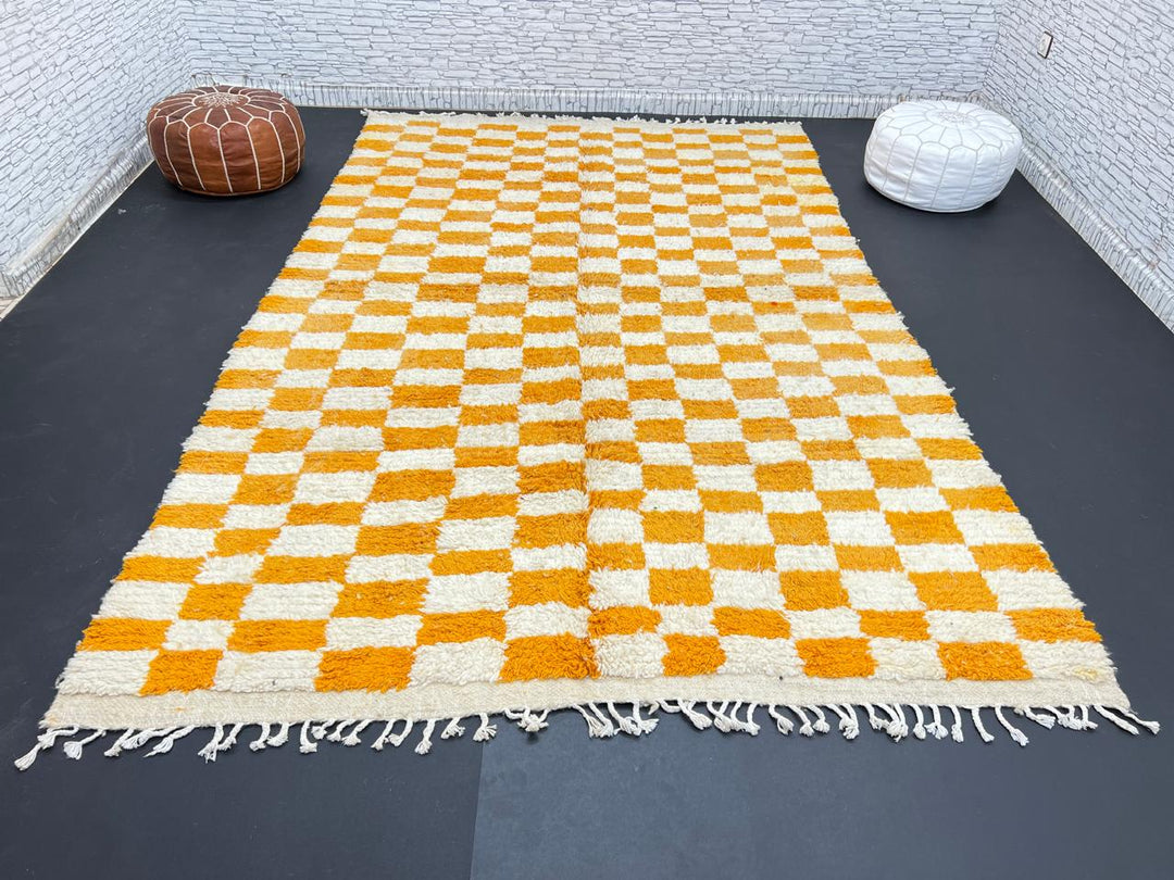 Handwoven Moroccan wool rug with yellow and cream checkered pattern