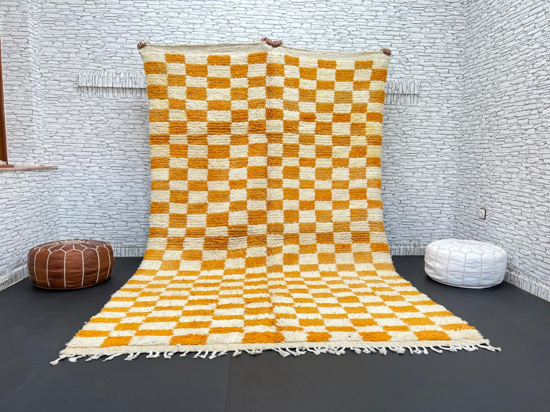 Handwoven Moroccan wool rug with yellow and cream checkered pattern