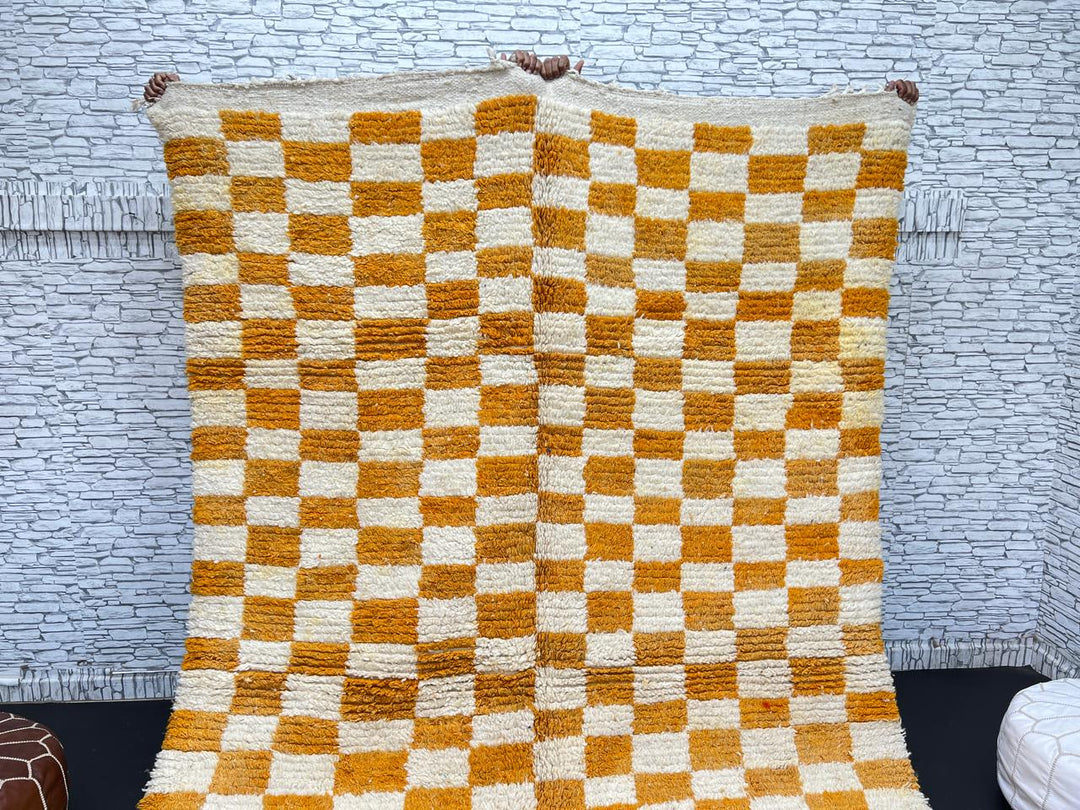 Handwoven Moroccan wool rug with yellow and cream checkered pattern