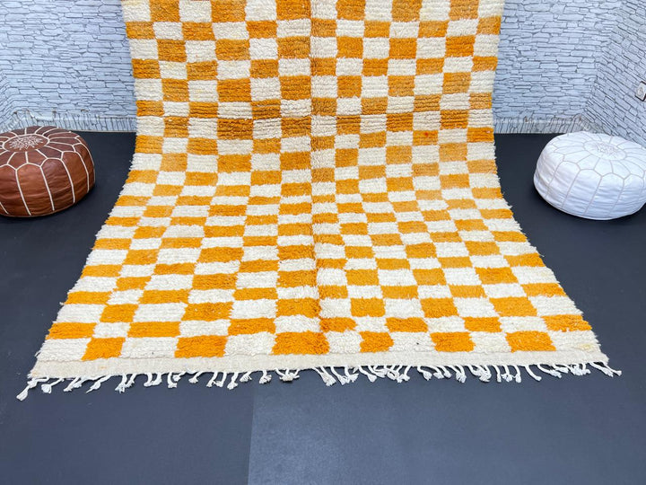 Handwoven Moroccan wool rug with yellow and cream checkered pattern