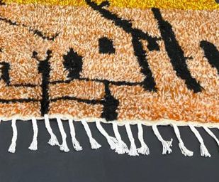 Handwoven yellow Moroccan wool runner rug with black abstract line pattern