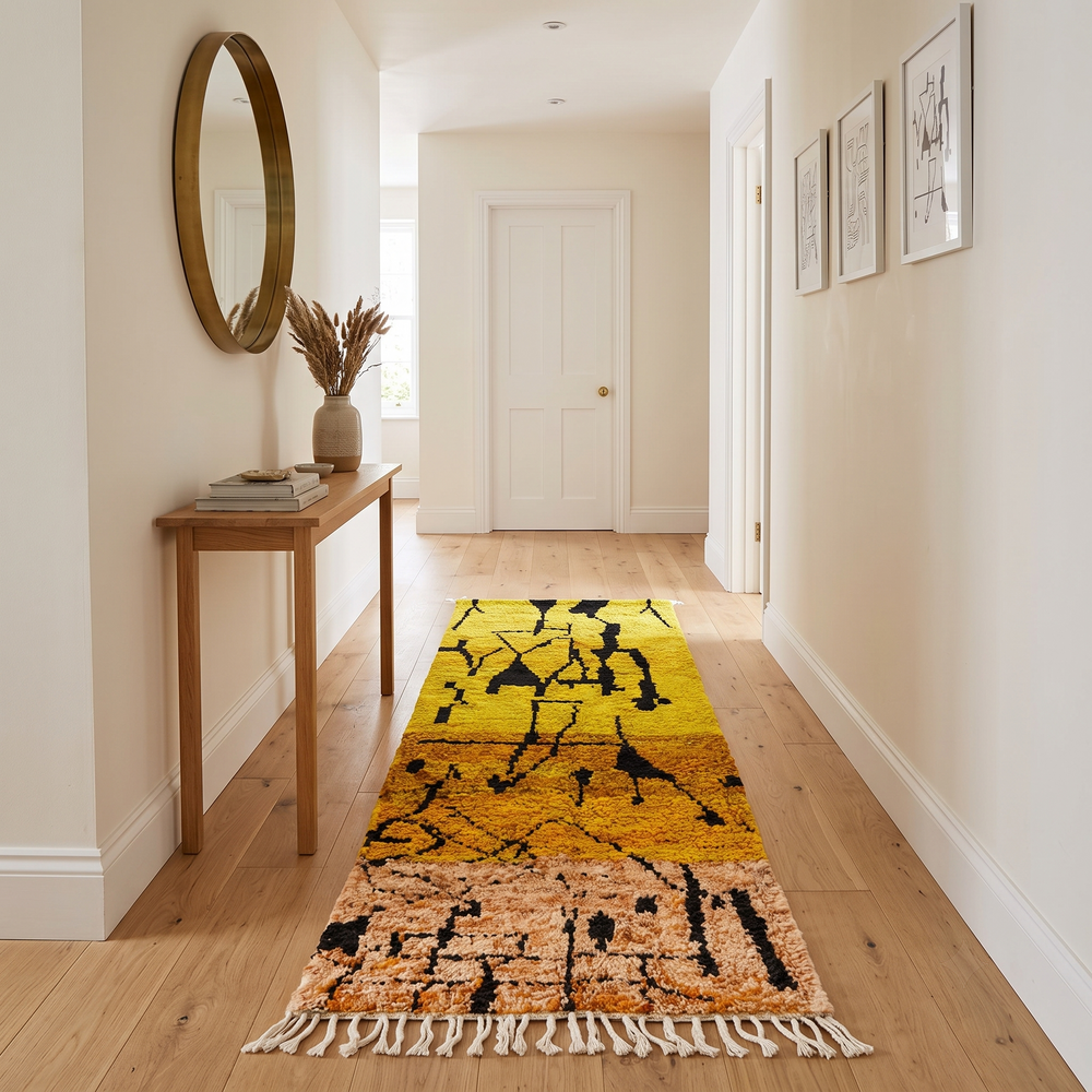 Handwoven yellow Moroccan wool runner rug with black abstract line pattern