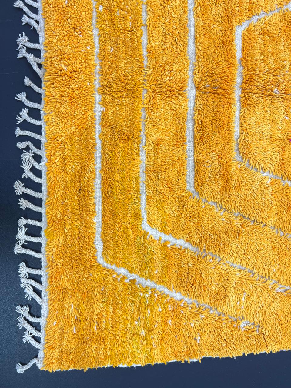 Abstract Moroccan runner rug handwoven in saffron gold wool with carved white chevron lines