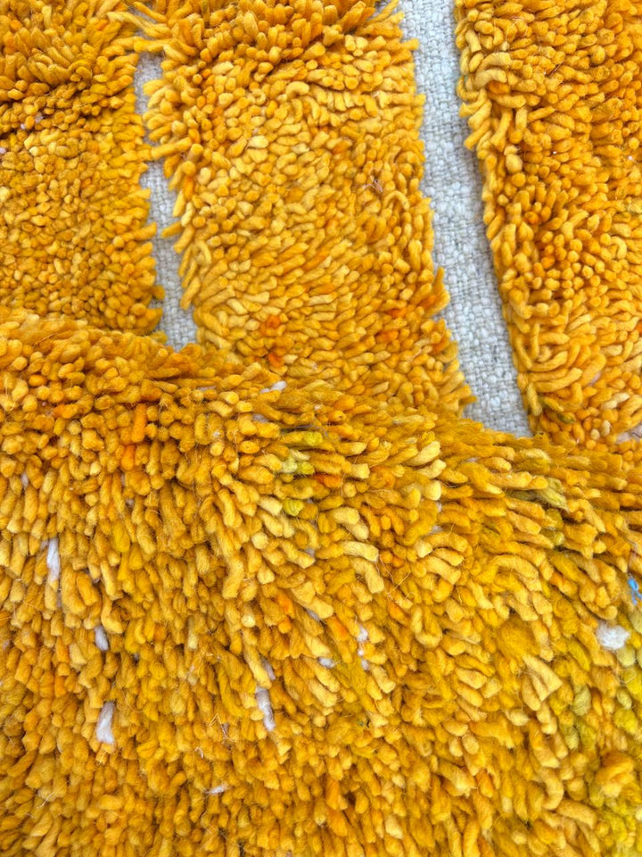 yellow moroccan wool rug with carved geometric berber lines high low texture handmade