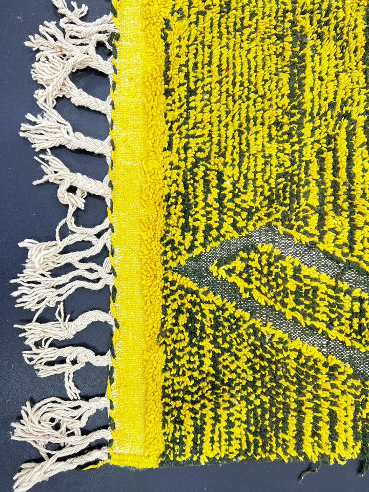 Handmade Moroccan runner rug with vibrant yellow background and green tribal line patterns, Berber style wool hallway rug