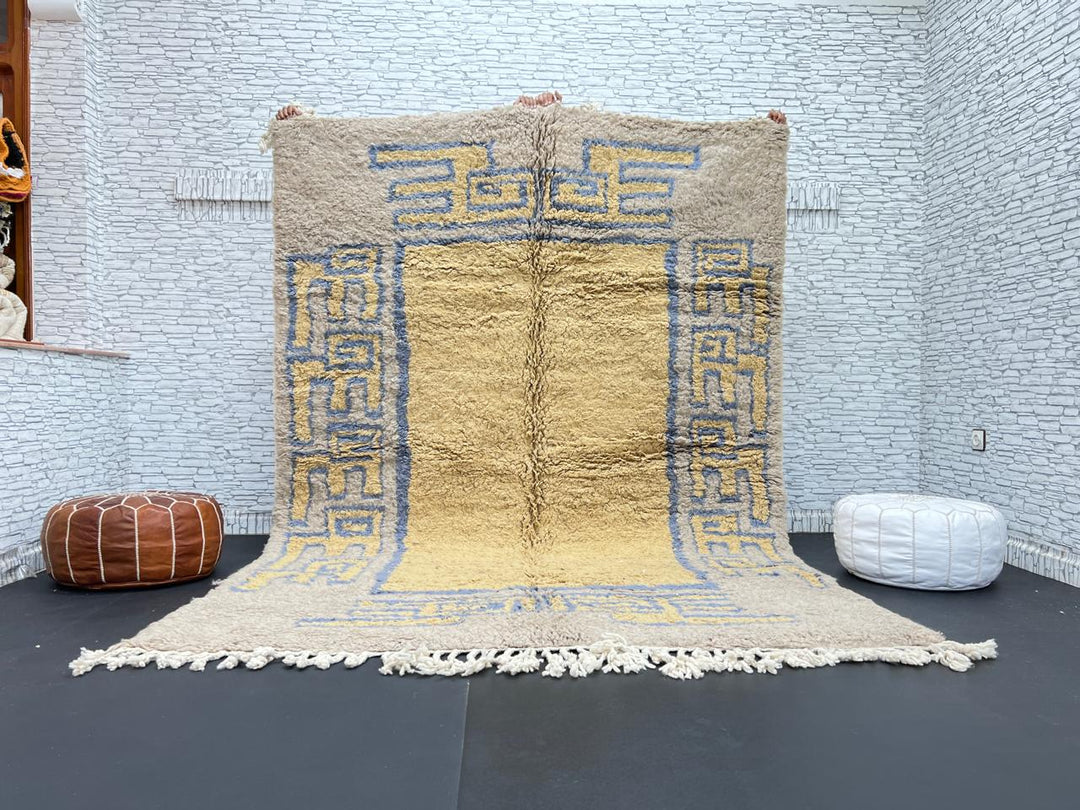 Yellow and blue Moroccan wool rug with geometric Berber border pattern