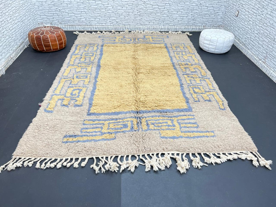 Yellow and blue Moroccan wool rug with geometric Berber border pattern