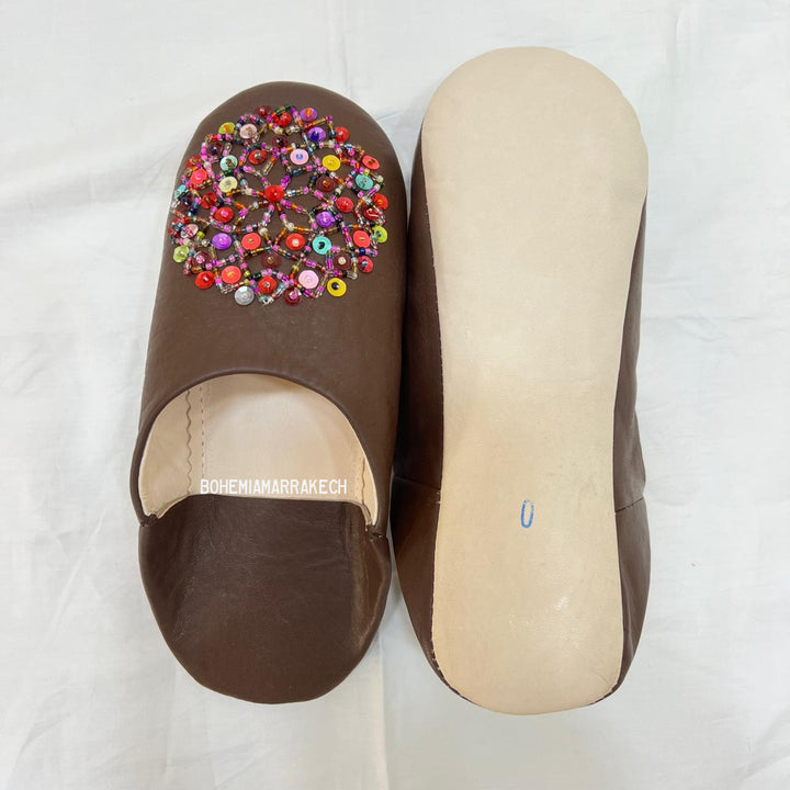 Handmade Moroccan leather babouche slippers with traditional pointed shape and simple hand stitching