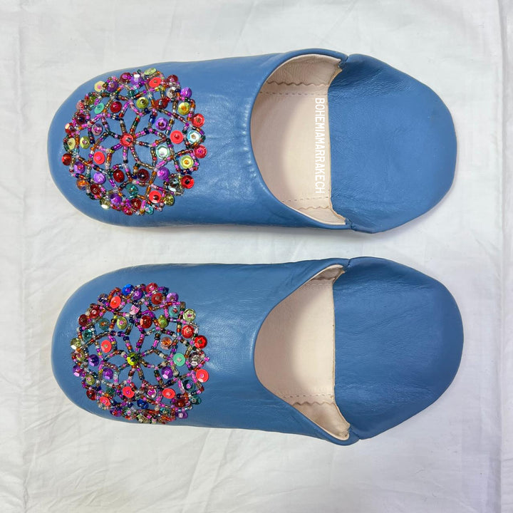 Traditional pointed Moroccan babouche slippers crafted from natural leather.