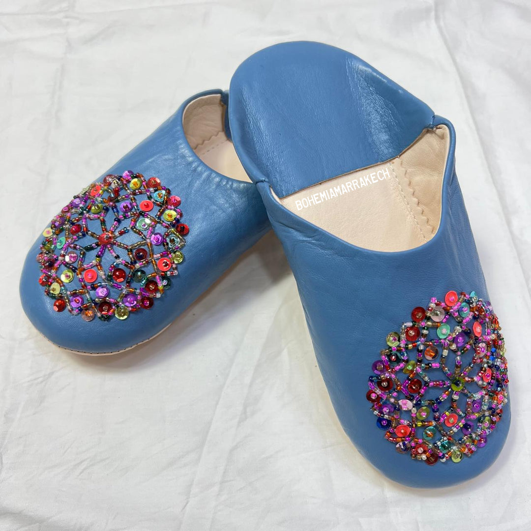 Traditional pointed Moroccan babouche slippers crafted from natural leather.