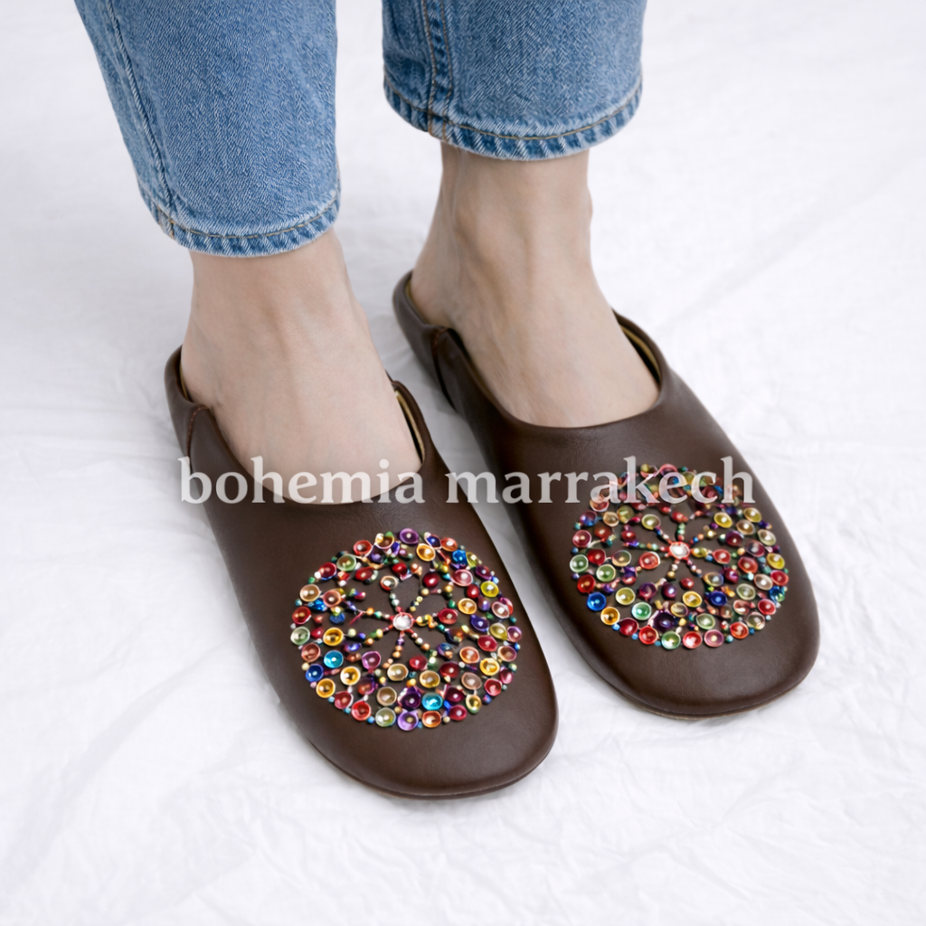Handmade Moroccan leather babouche slippers with traditional pointed shape and simple hand stitching
