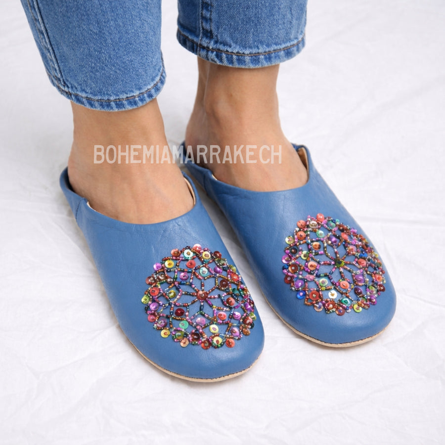Traditional pointed Moroccan babouche slippers crafted from natural leather.