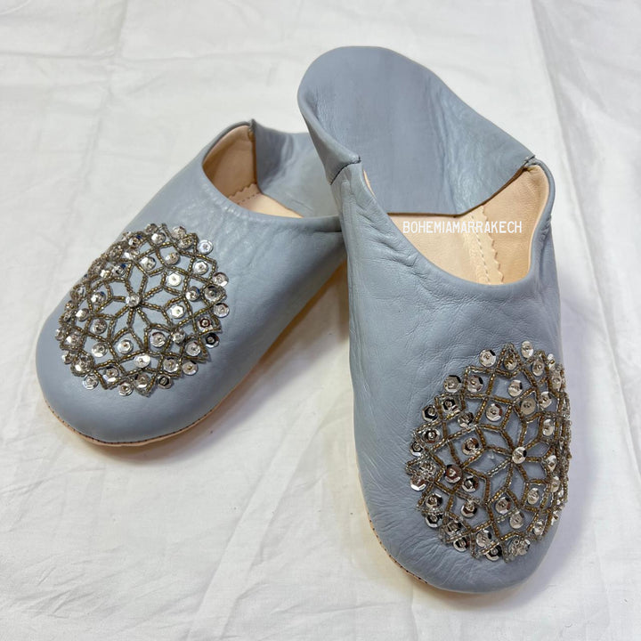 Traditional pointed Moroccan babouche slippers made from natural leather.