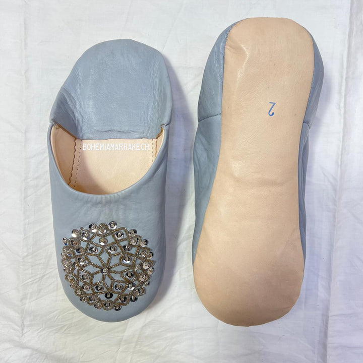 Traditional pointed Moroccan babouche slippers made from natural leather.
