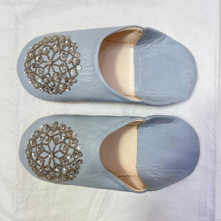 Traditional pointed Moroccan babouche slippers made from natural leather.